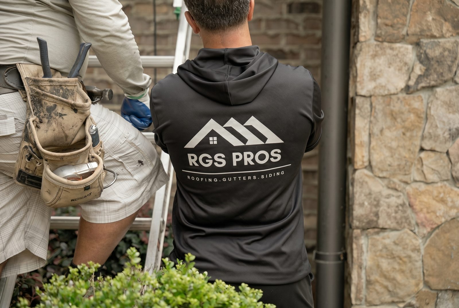 RGS Home Pros crew on the job — roofing, gutters, siding